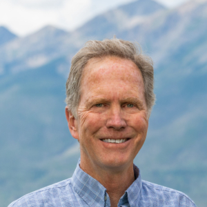 Summit Resort Group Real Estate Broker Dan Burnett on Lake Dillon with Peak 1 in the background