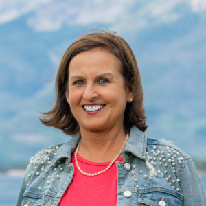 Summit Resort Group Real Estate Broker Deb Borel on Lake Dillon with Peak 1 in the background